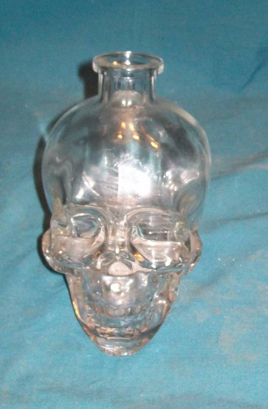 lot 71 image: Decoration Empty Crystal Skull Vodka Container without the Cork Top. No Alcohol.