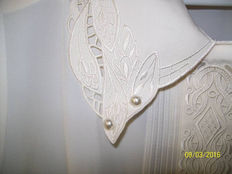 lot 24 image: Adult CostumeWhite-ish ShirtBlouse Unknown Size.  Tag 11JIAHUADA.  Hidden Button down Front