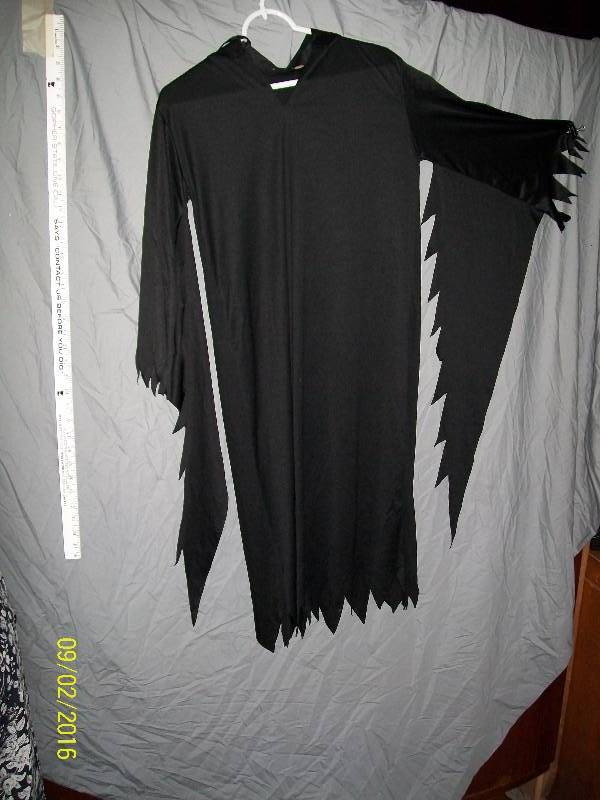 lot 4 image: Child Costume. Unknown Size. Black Midnight color with hood & long sleevesWitch