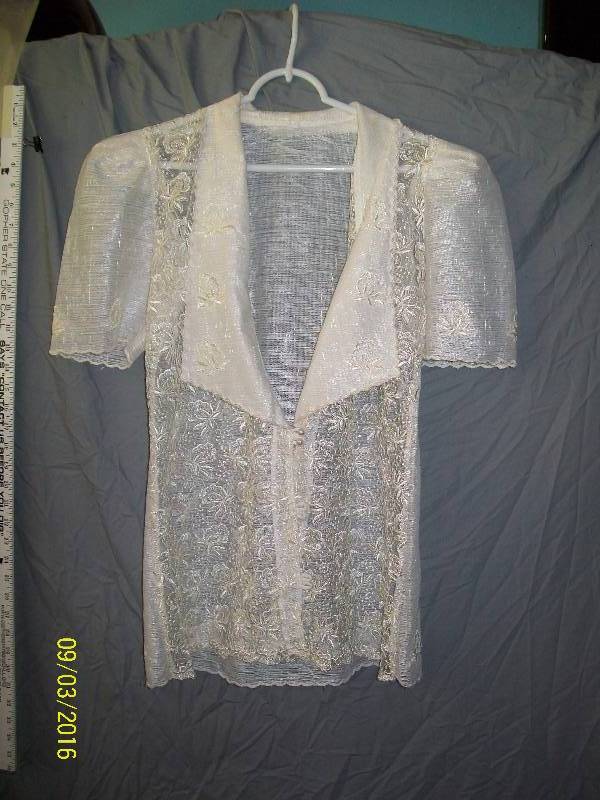 lot 22 image: Adult CostumeShear Jacket Cover with Intricate Floral Design