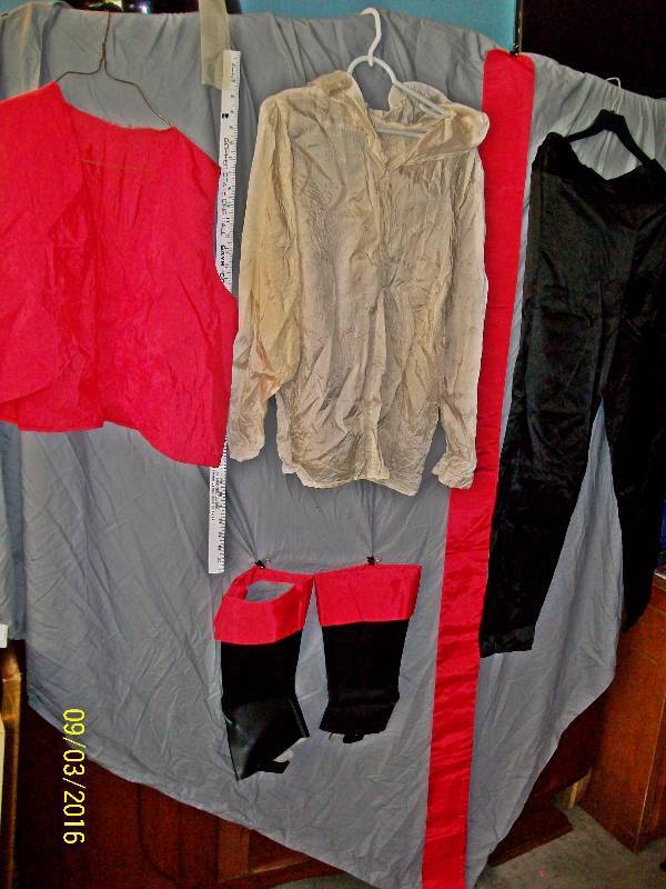 lot 31 image: Adult CostumePirate Shirt, Pants, Vest, Sash, Boot Covers.