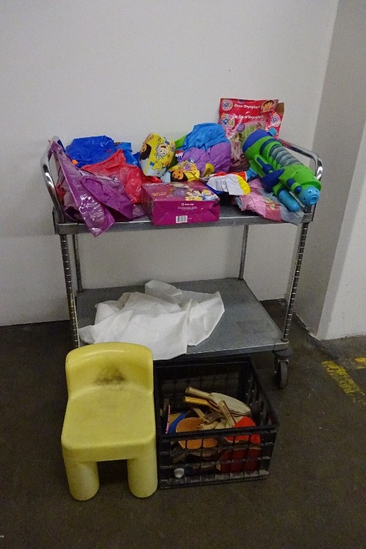 lot 70 image: Chair, water gun, variety of blow up water toys