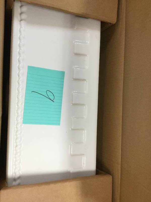 lot 9 image: Castlehaus Reversible Farmhaus Series Apron Front Fireclay 24 in. Single Bowl Kitchen Sink in White In Original box never used actual and stock photos used Retals for $700