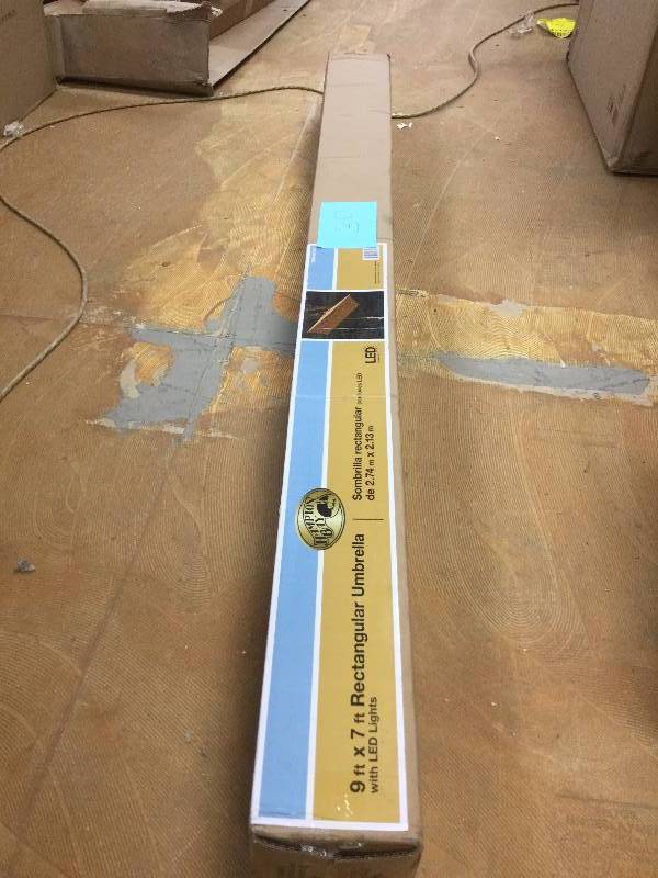 lot 30 image: Hampton Bay 9 ft x 7 ft Rectangular Umbrella never used in original box