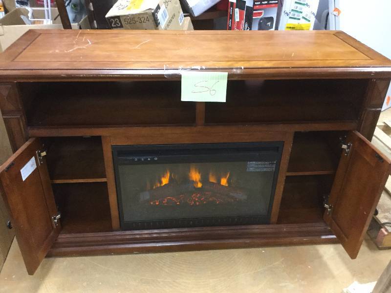 lot 56 image: Fireplace Entertainment Center- It has some scratches on Top and Sides