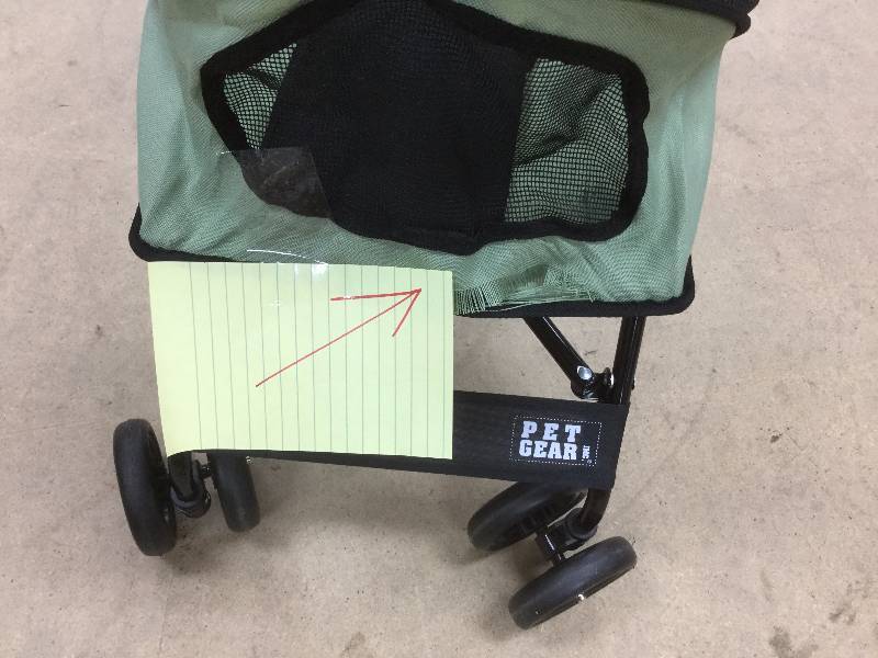 lot 103 image: Pet Gear Stroller not used but has a tear on front