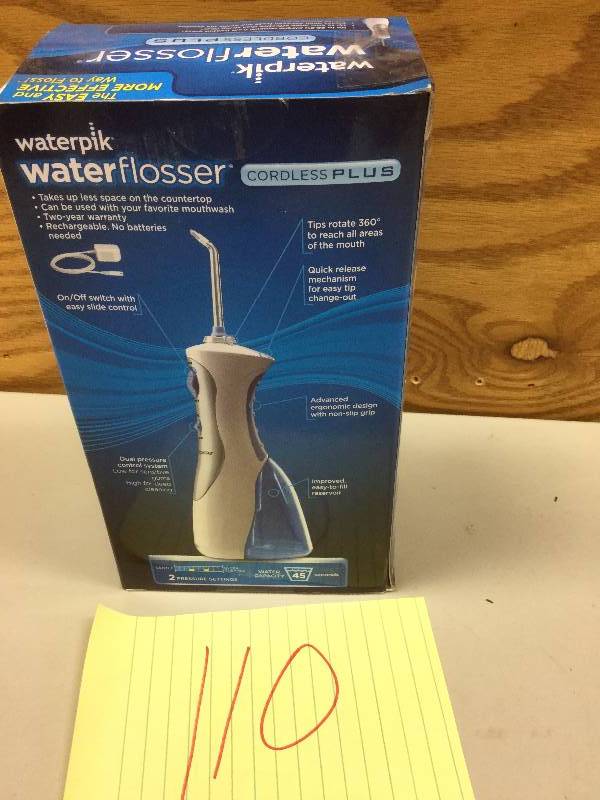 lot 110 image: Waterpik Water Flosser open box