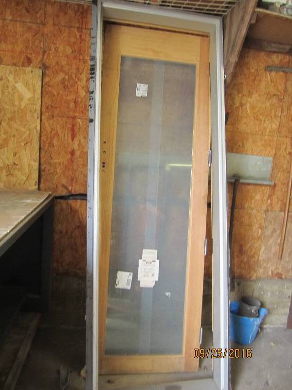 lot 7 image: Exterior door, 8 foot tall 32 wide...