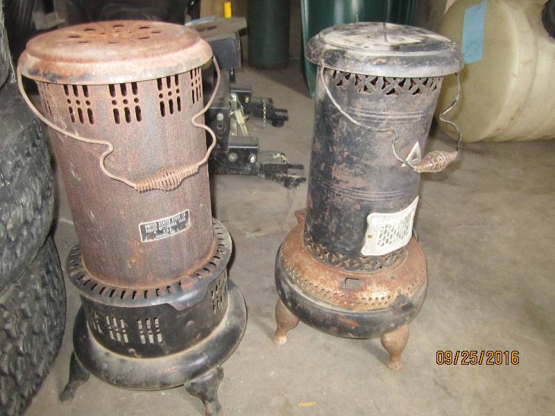 lot 28 image: 2 Antique kerosene stoves...