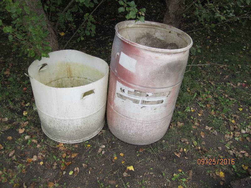 lot 47 image: 2 plastic barrels, use for planters...