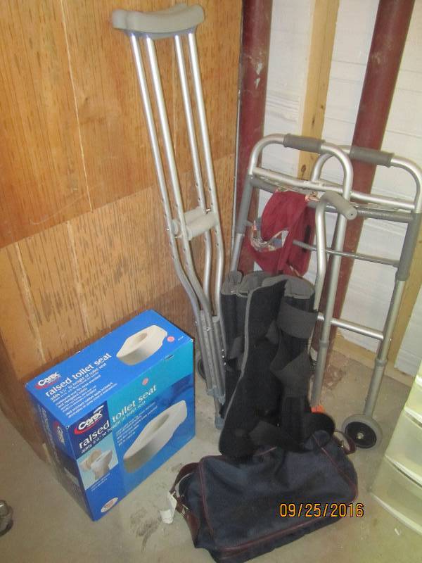 lot 66 image: Crutches, knee braces, raised toile...