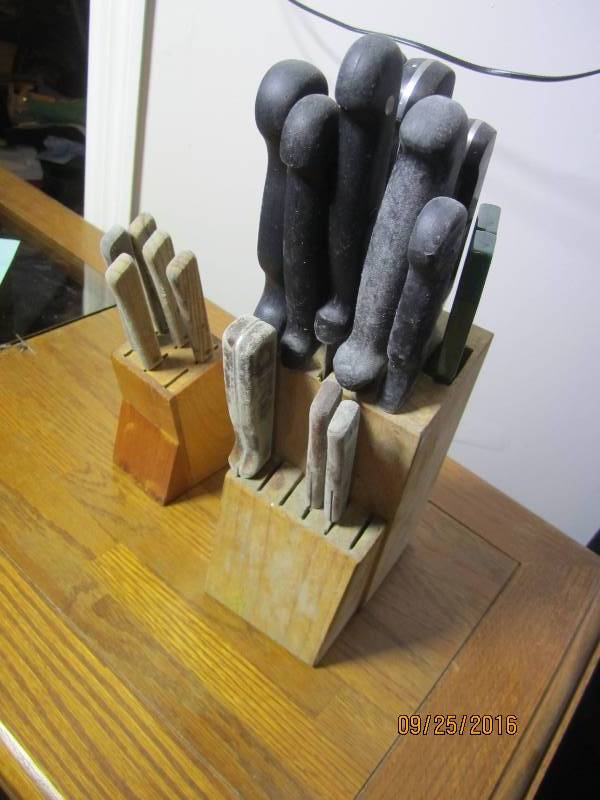 lot 99 image: 2 Sets of knives...