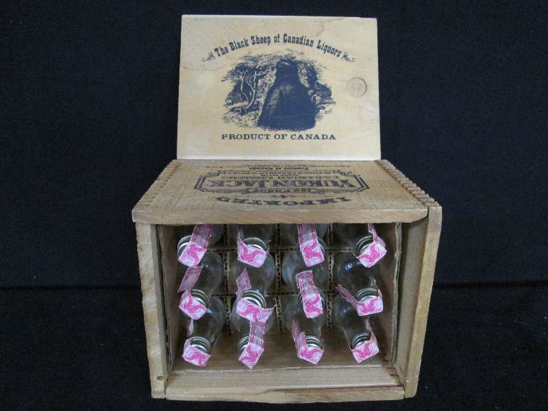 lot 11 image: Yukon Jack Wood Box with 12 Mini Bottles