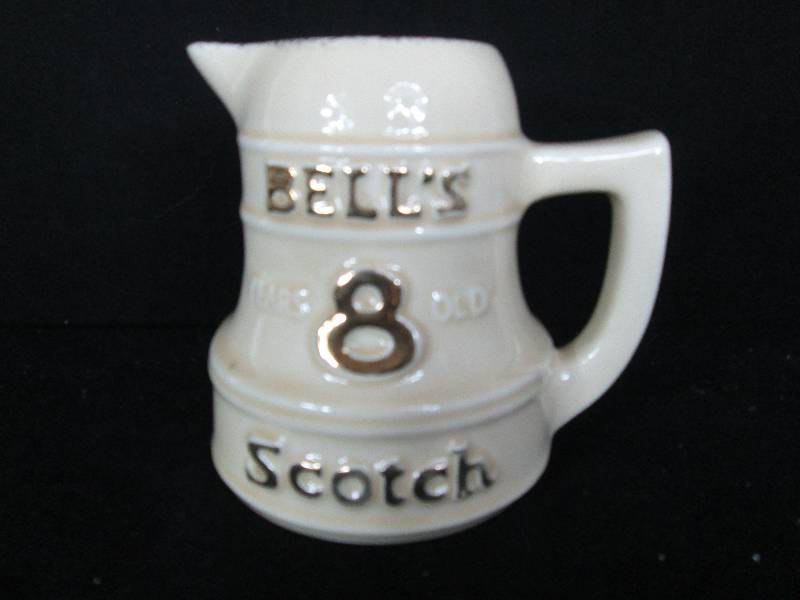 lot 31 image: Bells 8 Scotch Pitcher