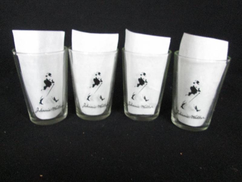 lot 37 image: Johnny walker Glasses