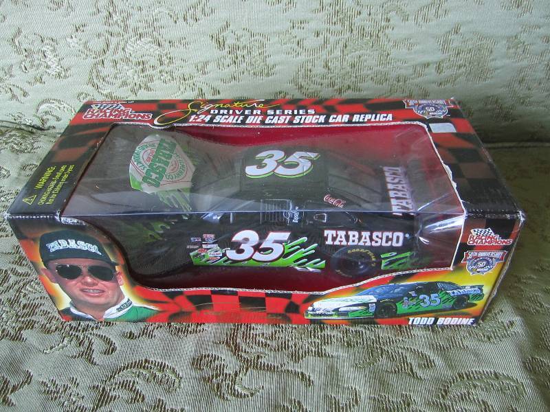 lot 6 image: Todd Bodine 124 scale die cast car...
