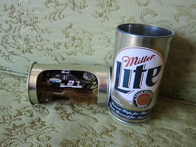 lot 21 image: Miller light can, center pulls out ...