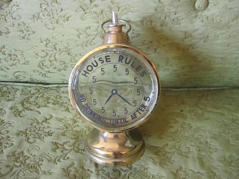 lot 27 image: Music box shot pourer, works...