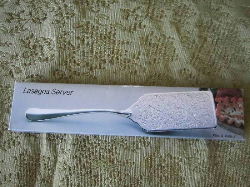 lot 33 image: New W M A Rogers lasagna server...