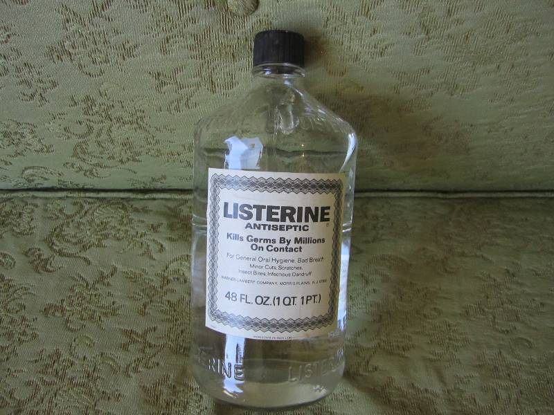lot 52 image: Full glass bottle of Listerine mout...