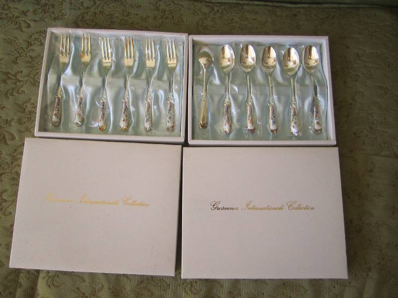 lot 68 image: Collectible fork and spoon set...