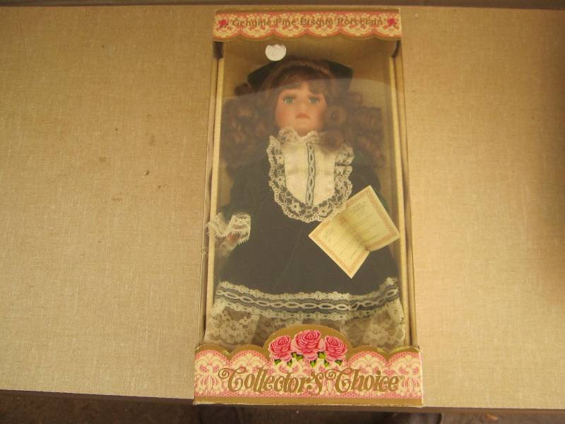 lot 77 image: Porcelain doll in box...