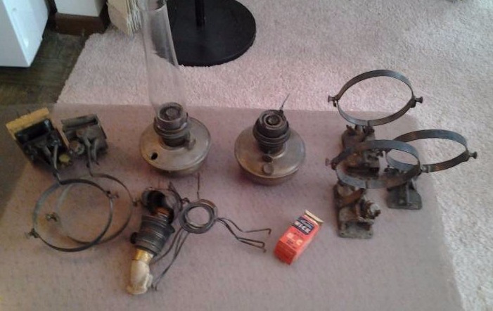 lot 22 image: 2-Vintage Aladdin Model B Oil Lamps, Wall Brackets, Shade Brackets, Wicks, Misc