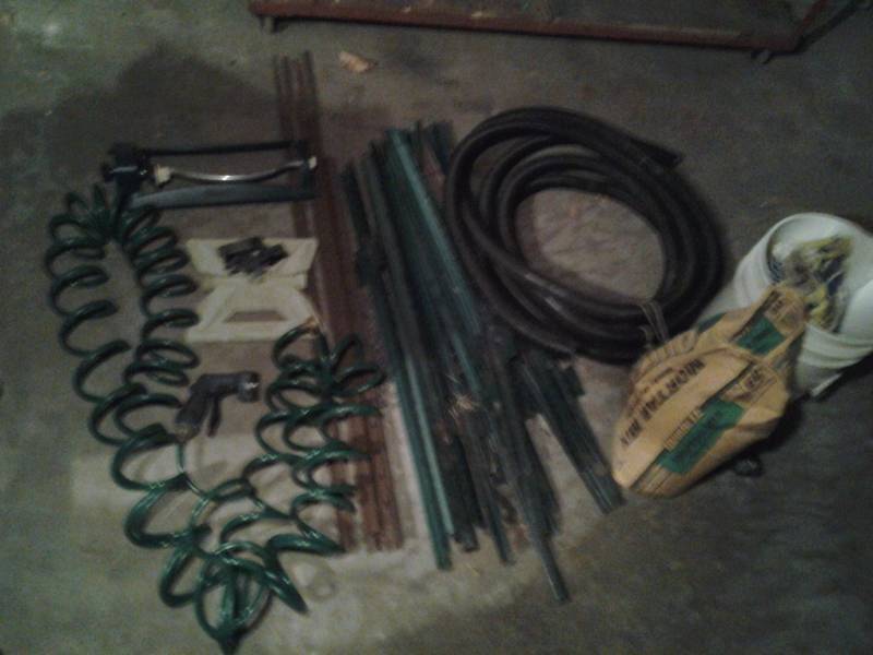 lot 63 image: Fence Posts, Quikrete, Drain Hose, Sprinklers