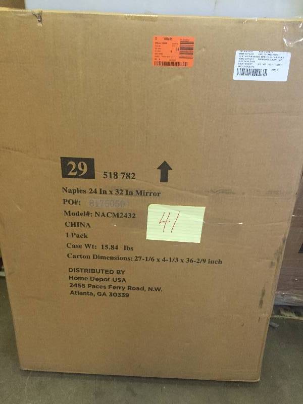lot 41 image: Foremost Naples 32 in. L x 24 in. W Wall Mirror in Warm Cinnamon New in original box stock photo used to display item