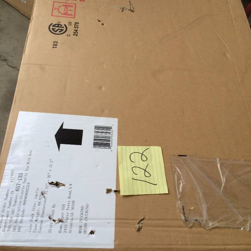 lot 122 image: Pegasus 31w x22d in Granite Vanity Top with Biscuit Bowl Never used in original pkg