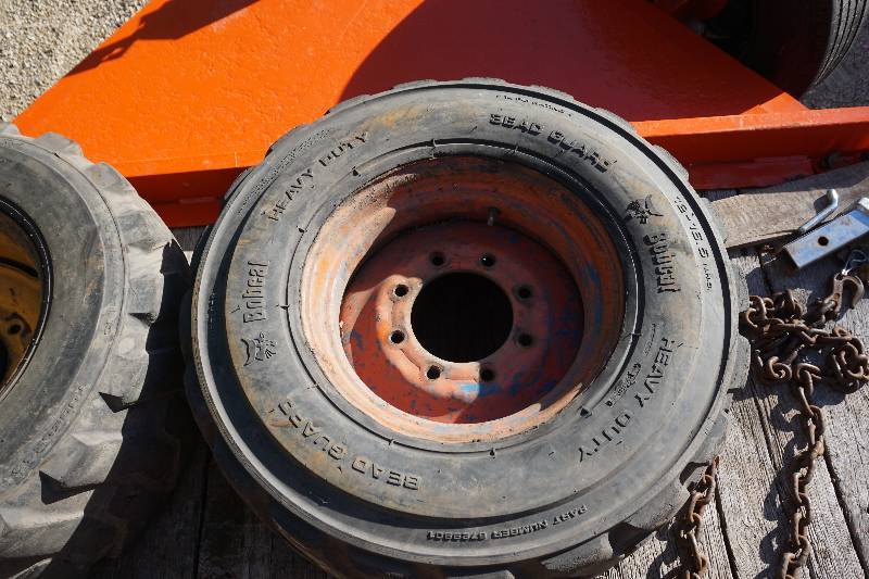 lot 12 image: Set of 2 - Skid Loader Tires and Rims