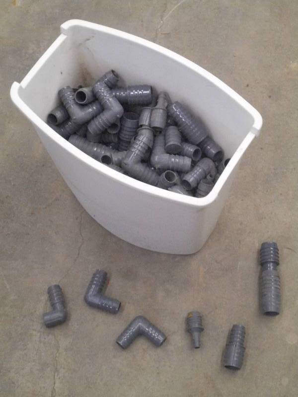 lot 43 image: Garbage Can Full Of Assorted Hose R...