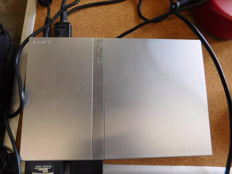 lot 76 image: Sony Play Station 2 Silver Slim