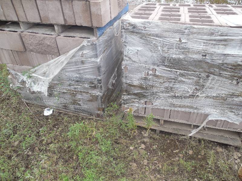 lot 279 image: (2) PALLETS OF 8X10X16 ROCK FACED RED BLOCK