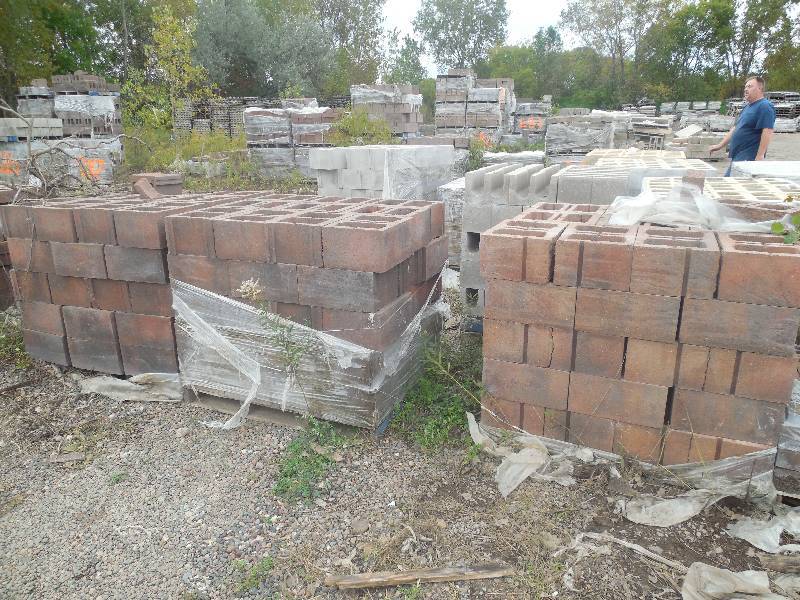lot 290 image: (3) PALLETS OF 8X12X16 ROCK FACED CONCRETE BLOCK- RED