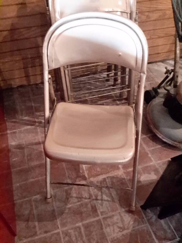 7, Steel folding Chairs.. Nice shape