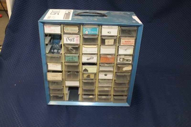 Parts cabinet with parts and hardware