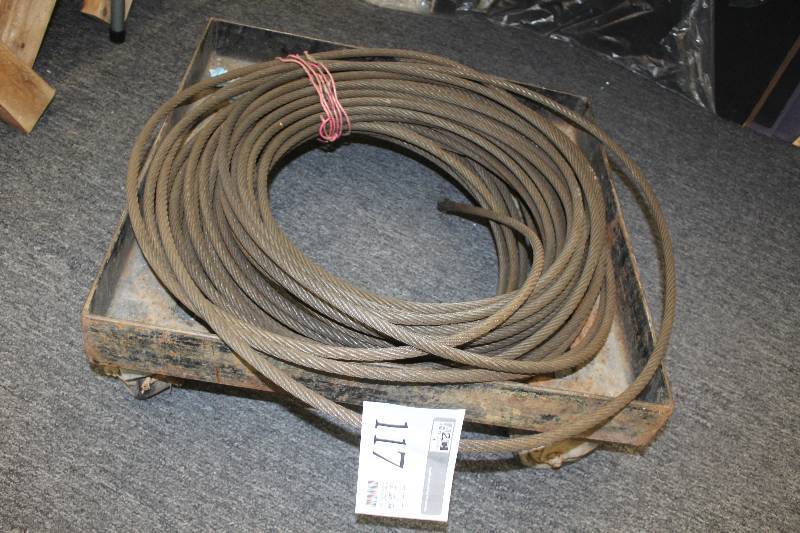 100 feet of 9 strand steel cable w heavy metal cart