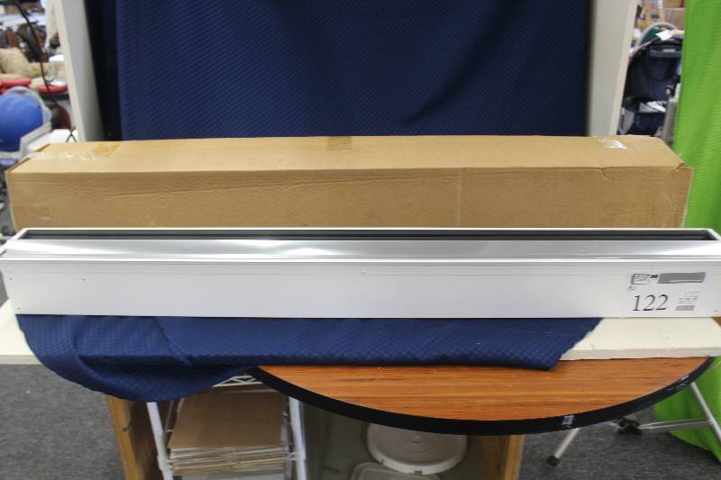 2 4 fluorescent ceiling or wall mounted fixtures