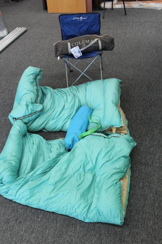 2 down filled sleeping bags and three folding chairs