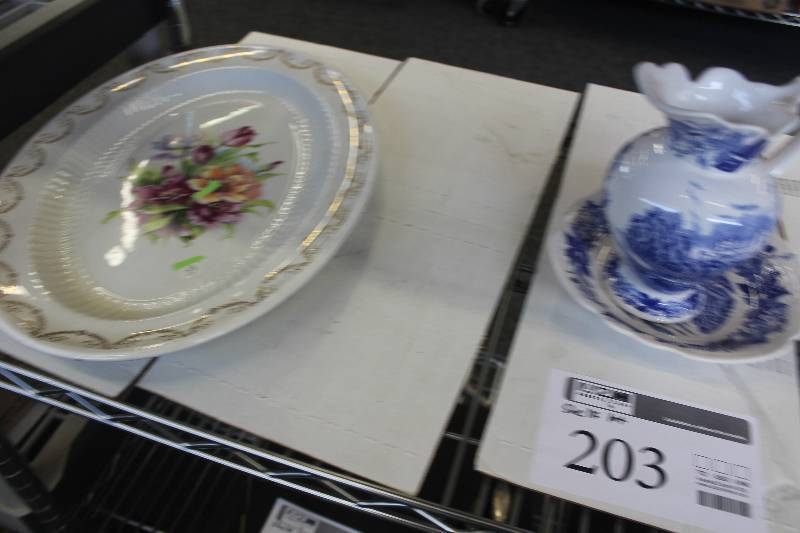 Large serving platter, pitcher and plate.