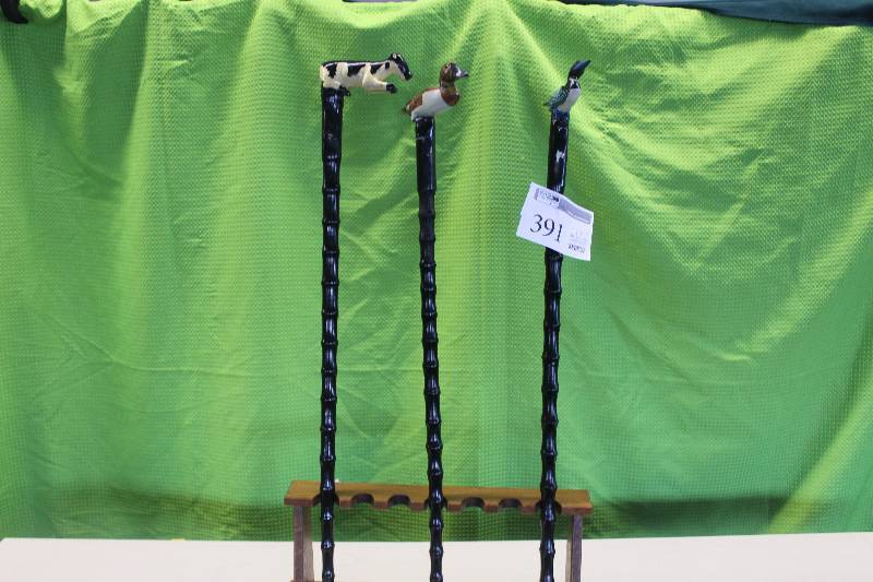 Hand painted, hand carved walking sticks. 1 Loon 1Cow 1 duck