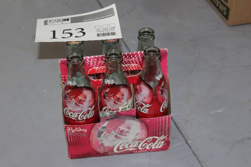 Vintage CocaCola bottles with carrying case