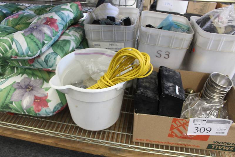 3 buckets of zippers and misc sewing supplies, 1 extension cord, mailboxes, seat cushions