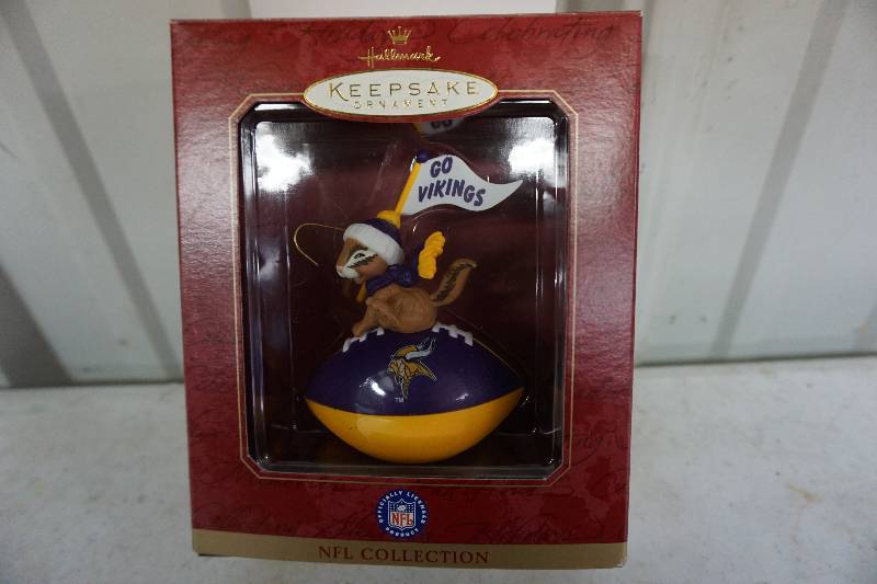 lot 39 image: Minnesota Vikings Hallmark Keepsake Squirell on Football Christmas Ornament Decorative Pendant