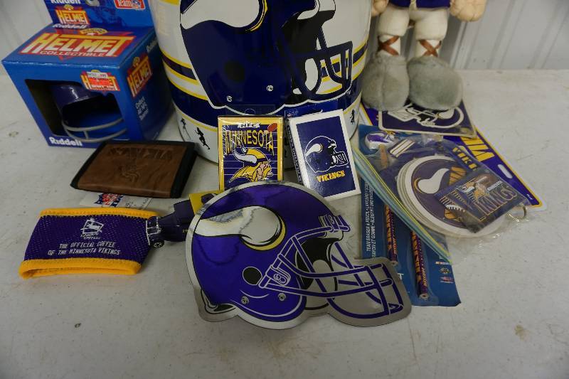 lot 55 image: Minnesota Vikings Metal Tin With Assorted Viking Items