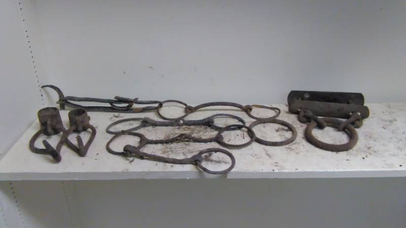 Vintage Horse Tack bits (4), hitching post tie (3).