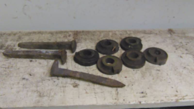 Bucket of railroad Spikes  (6) bushings
