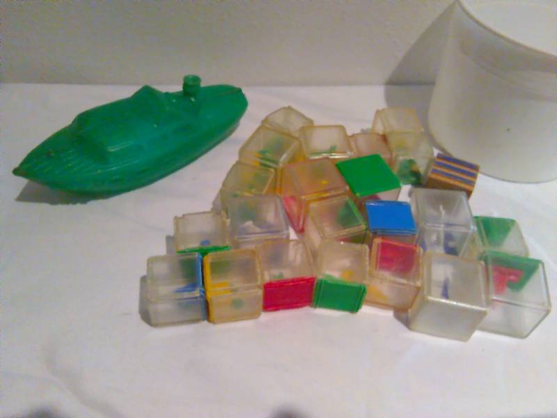 lot 15 image: 1960 vintage plastic building blocks and plastic boat