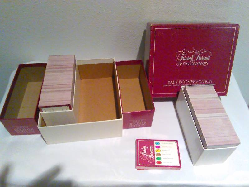 lot 155 image: Trivia Pursuit, Trivia Adventure plus, Trivia Pursuit Baby Boomers Edition